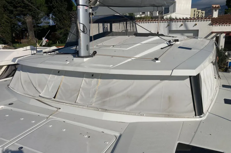  Yacht Photos Pics 2024 Fountaine Pajot Catamaran Astrea 42, deck view with mast and sail details.