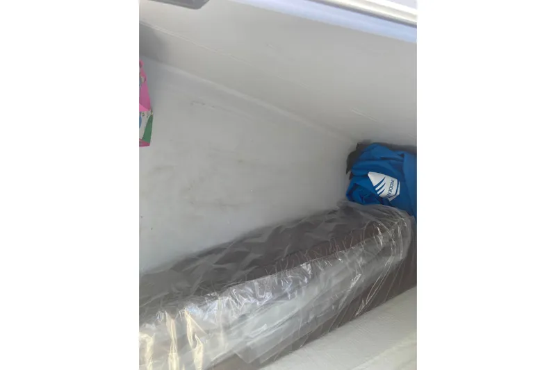  Yacht Photos Pics Interior storage space in 2024 Fountaine Pajot Catamaran Astrea 42, featuring a covered mattress.