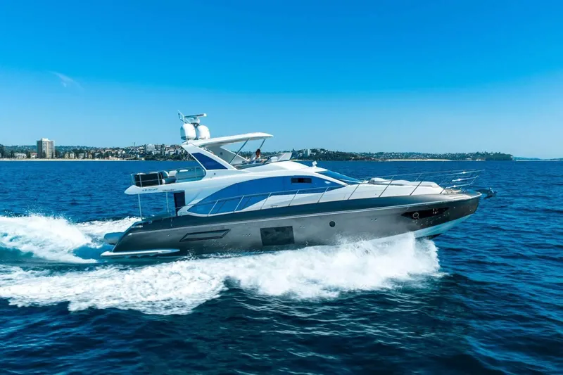  Yacht Photos Pics 2018 Azimut Flybridge yacht cruising on open blue sea.