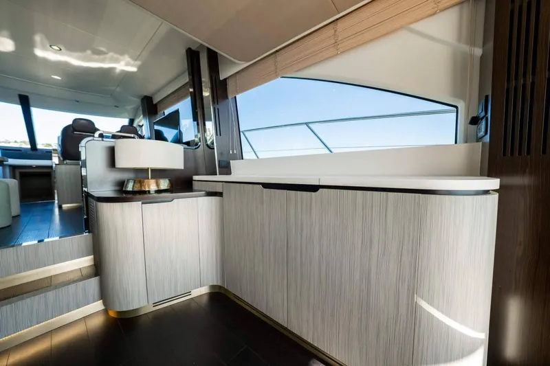  Yacht Photos Pics Luxurious interior of 2018 Azimut Flybridge yacht with modern furnishings and sleek design.