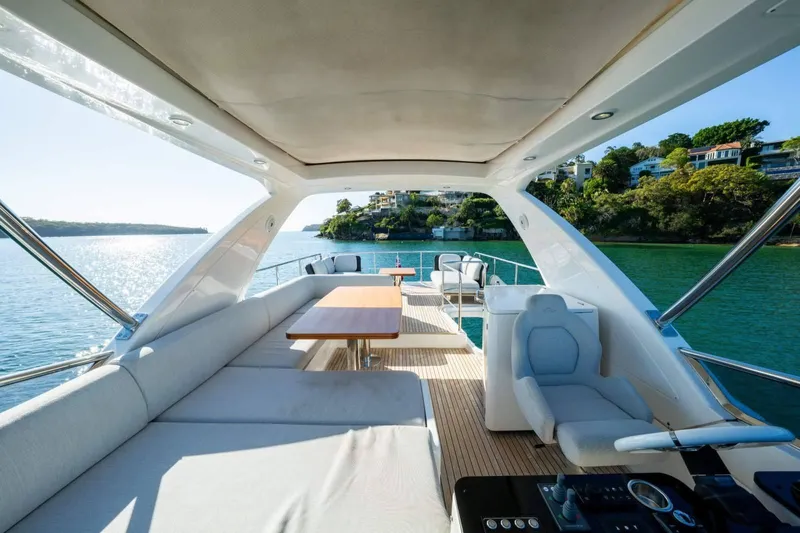  Yacht Photos Pics Luxurious 2018 Azimut Flybridge yacht interior with scenic waterfront view.