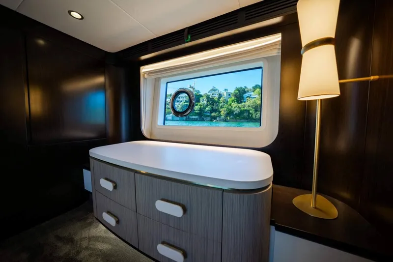  Yacht Photos Pics Luxurious interior of 2018 Azimut Flybridge yacht with elegant furnishings and scenic window view.