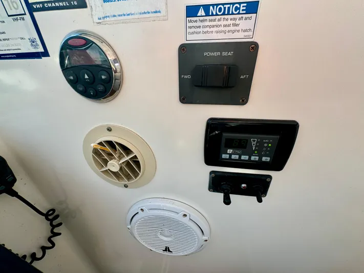  Yacht Photos Pics Control panel of a 2006 Tiara Yachts 3200 Open with various switches and displays.