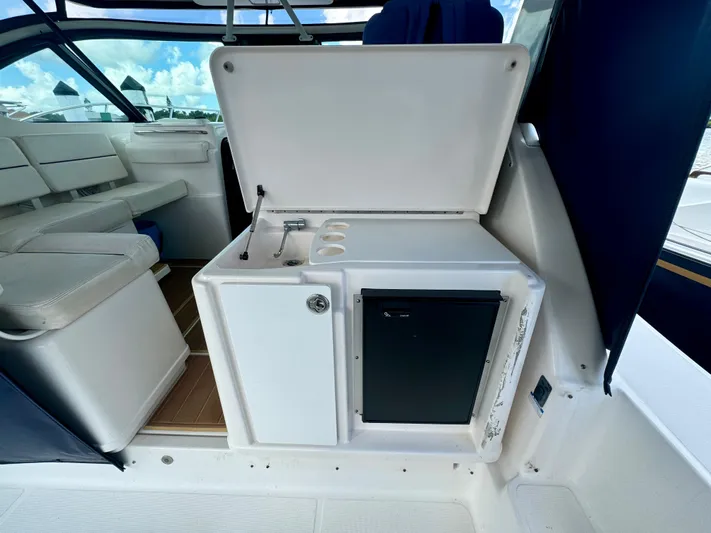  Yacht Photos Pics 2006 Tiara Yachts 3200 Open interior with seating and kitchenette area.