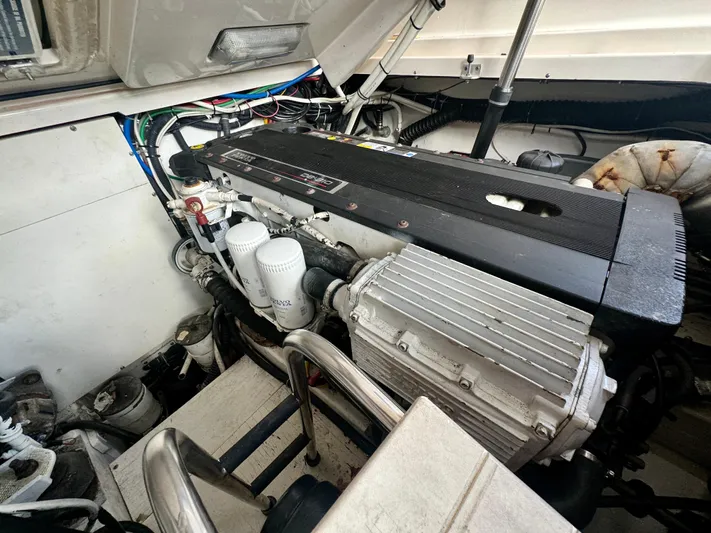  Yacht Photos Pics Engine compartment of a 2006 Tiara Yachts 3200 Open, showcasing detailed mechanical components.