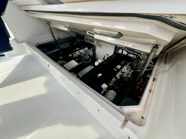  Yacht Photos Pics Engine compartment of 2006 Tiara Yachts 3200 Open, showcasing mechanical components.
