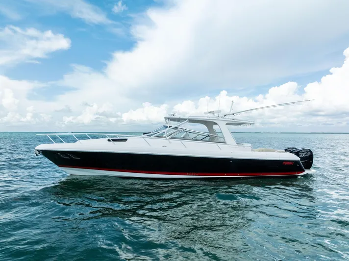 Virgo Yacht Photos Pics 2018 Intrepid 430 Sport Yacht on open water under a clear blue sky.