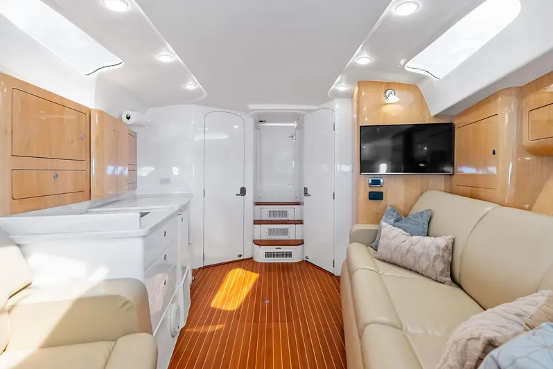 Virgo Yacht Photos Pics Luxurious interior of 2018 Intrepid 430 Sport Yacht with modern amenities and elegant design.