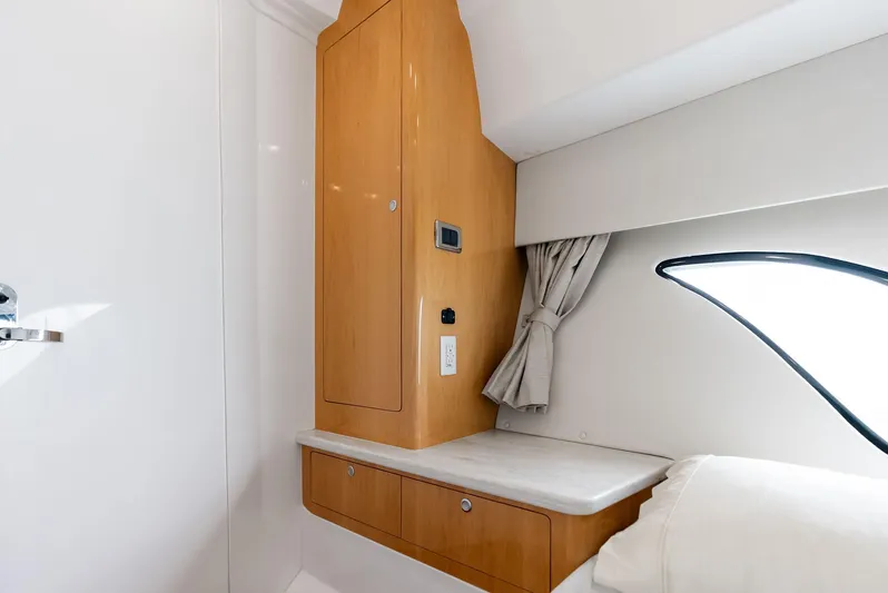 Virgo Yacht Photos Pics 2018 Intrepid 430 Sport Yacht interior with wooden cabinetry and modern design.