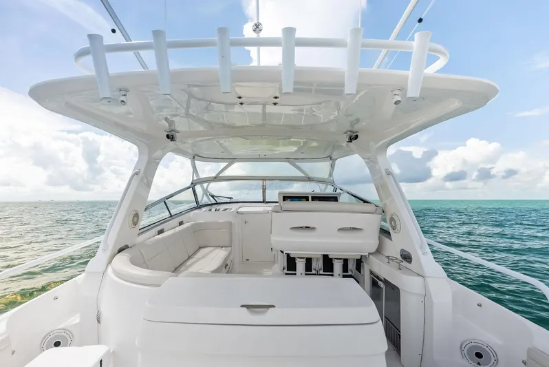 Virgo Yacht Photos Pics 2018 Intrepid 430 Sport Yacht interior with ocean view, featuring sleek seating and modern design.