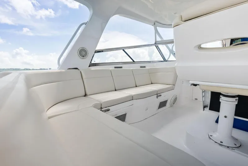 Virgo Yacht Photos Pics Luxurious interior of 2018 Intrepid 430 Sport Yacht with white seating and modern design.