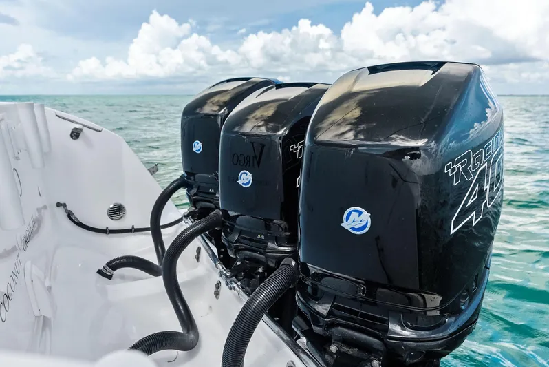 Virgo Yacht Photos Pics 2018 Intrepid 430 Sport Yacht with triple outboard engines on open water.