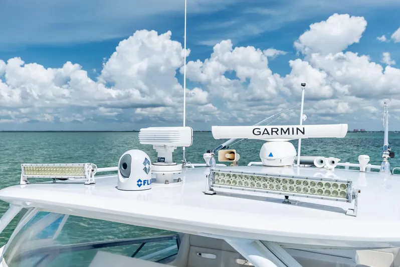 Virgo Yacht Photos Pics 2018 Intrepid 430 Sport Yacht with advanced Garmin navigation equipment on a sunny day.