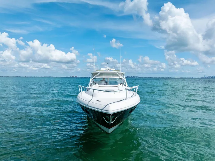 Virgo Yacht Photos Pics 2018 Intrepid 430 Sport Yacht on open water under a blue sky.