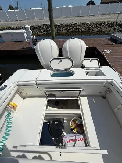  Yacht Photos Pics 2018 Jupiter 26 FS boat interior with storage compartments and safety gear.