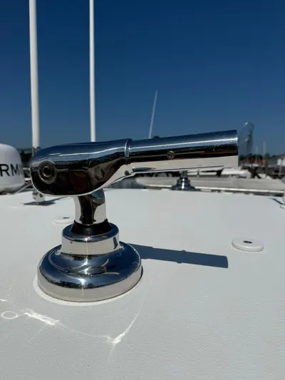  Yacht Photos Pics Chrome fitting on a 2018 Jupiter 26 FS boat under clear blue sky.