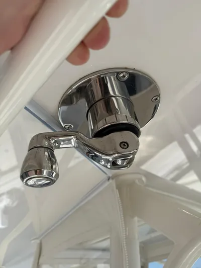  Yacht Photos Pics Chrome boat fixture on a 2018 Jupiter 26 FS, close-up view.