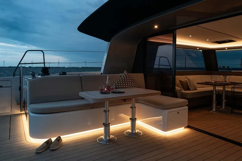  Yacht Photos Pics Luxurious Vaan R4 yacht deck with ambient lighting and elegant seating, 2025 model.
