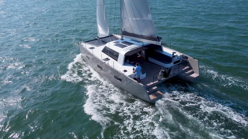  Yacht Photos Pics Sailing catamaran Vaan R4 2025 cruising on open water.