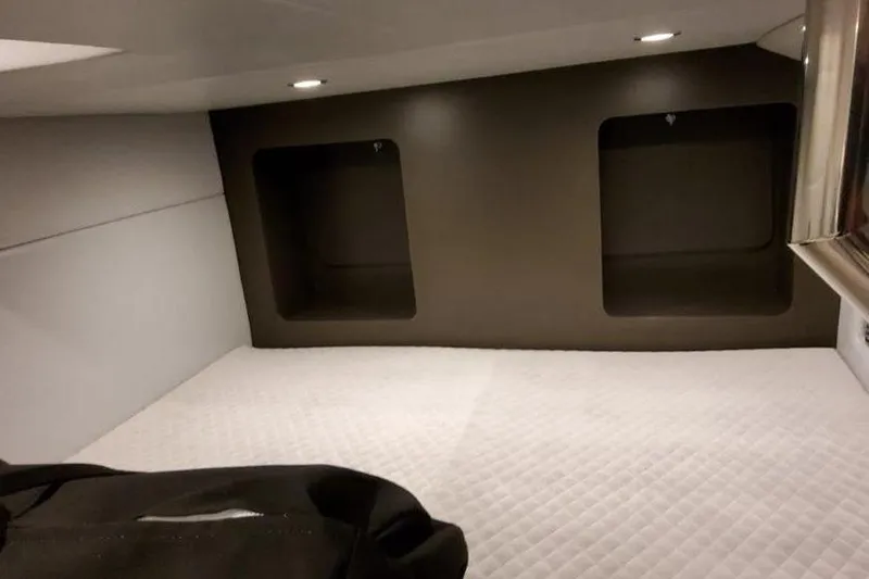 330 Cbr Yacht Photos Pics 2025 Formula 350 Crossover Bowrider I/O cabin interior with quilted bedding and recessed lighting.