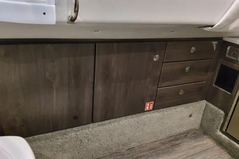 330 Cbr Yacht Photos Pics Interior of 2025 Formula 350 Crossover Bowrider I/O with wood cabinetry and carpeted flooring.