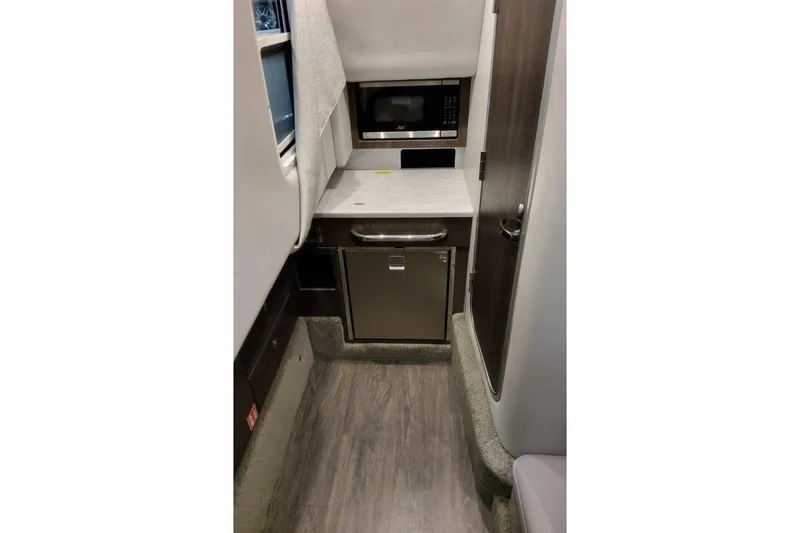 330 Cbr Yacht Photos Pics Interior of 2025 Formula 350 Crossover Bowrider I/O with kitchenette.