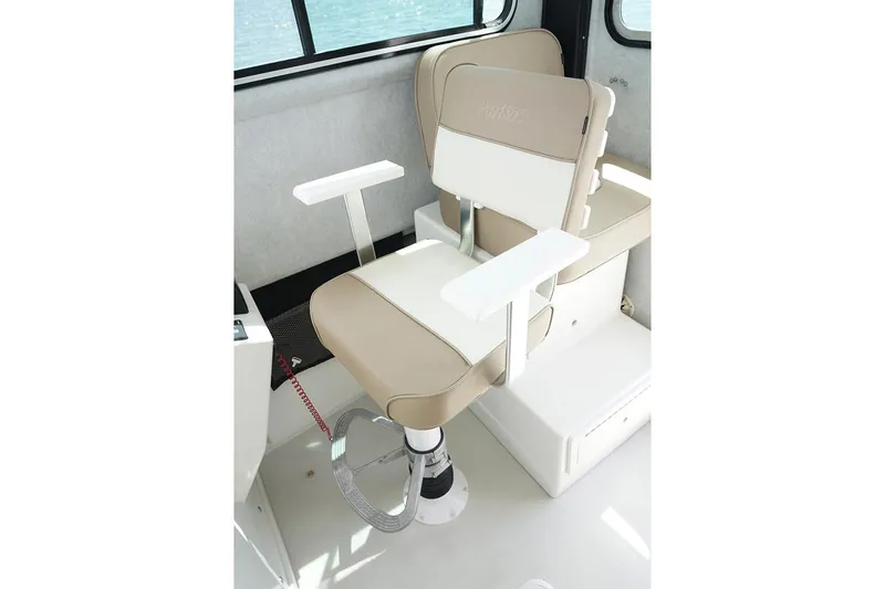  Yacht Photos Pics Manufacturer Provided Image: 2019 Parker 2520 XL Sport Cabin captain's chair with beige and white upholstery.