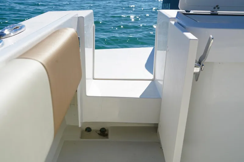  Yacht Photos Pics Manufacturer Provided Image: 2019 Parker 2520 XL Sport Cabin boat interior with open door and ocean view.