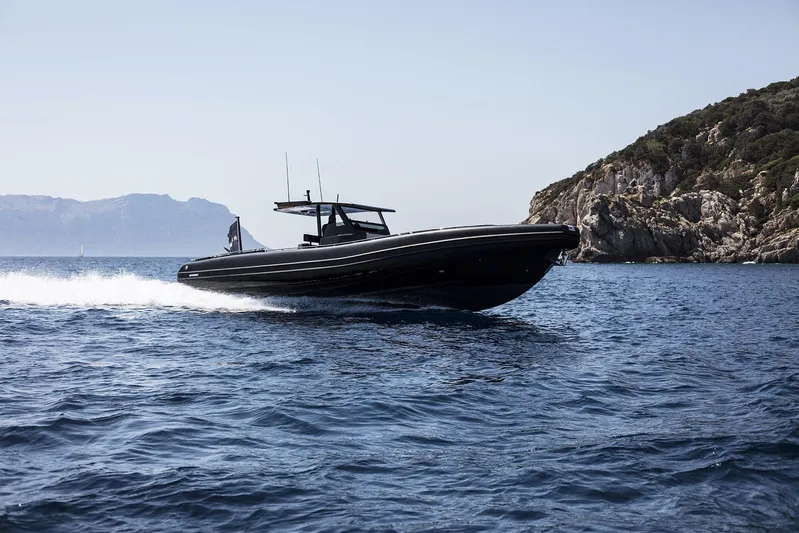 Black Shiver 120 Efb Yacht Photos Pics Novamarine Black Shiver 120 Diesel 2025 cruising near rocky coastline.