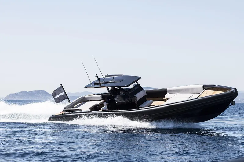 Black Shiver 120 Efb Yacht Photos Pics 2025 Novamarine Black Shiver 120 Diesel cruising on open water, showcasing sleek design and performance.