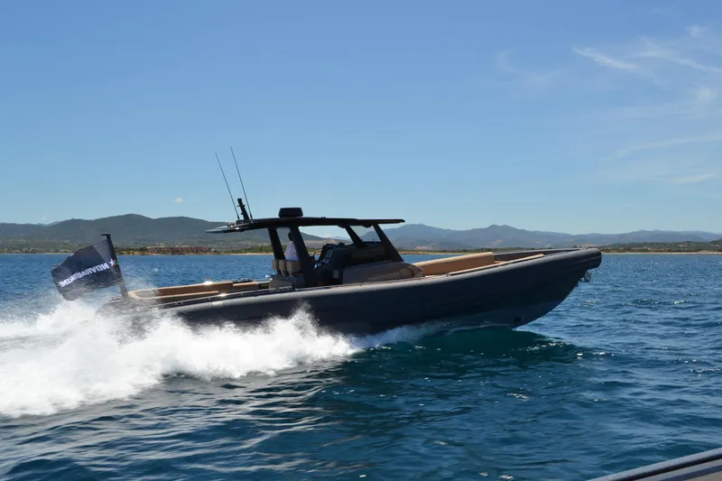 Black Shiver 120 Efb Yacht Photos Pics Novamarine Black Shiver 120 Diesel 2025 cruising on open water under clear skies.