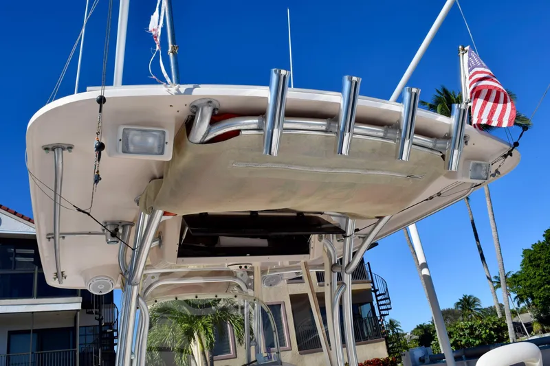  Yacht Photos Pics 2006 Grady-White Bimini 306 boat with rod holders and American flag.