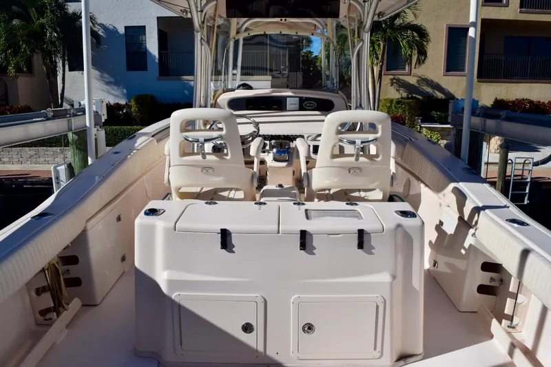  Yacht Photos Pics 2006 Grady-White Bimini 306 boat interior with dual helm seats and spacious deck.