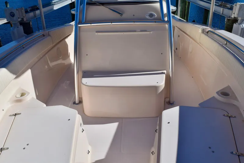  Yacht Photos Pics 2006 Grady-White Bimini 306 boat interior with seating and storage compartments.
