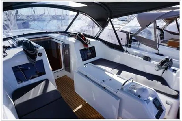  Yacht Photos Pics Jeanneau Sun Odyssey 410 cockpit, 2022 model, featuring sleek design and comfortable seating.