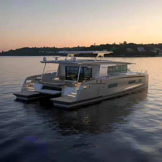 Eco Yacht Photos Pics Mazarin 75 iYacht 2026 at sunset on calm waters.