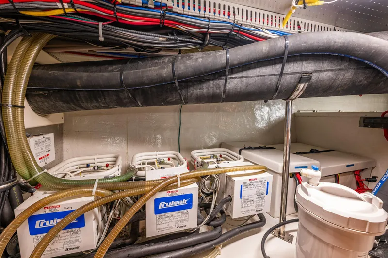 Flyin Low Yacht Photos Pics Engine room of 2007 DeFever 56 yacht with Cruisair systems and wiring.