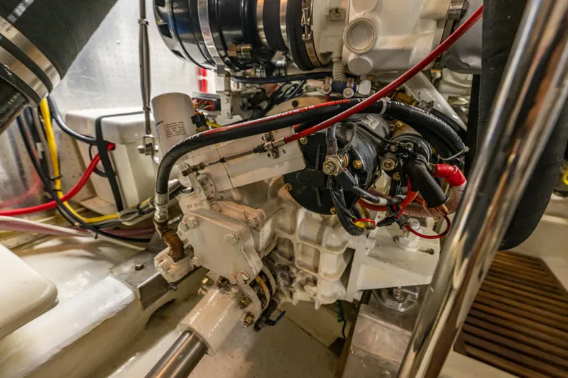 Flyin Low Yacht Photos Pics Engine room of a 2007 DeFever 56 yacht, showcasing detailed mechanical components.