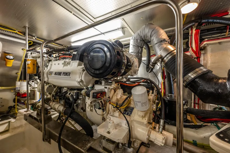 Flyin Low Yacht Photos Pics Engine room of 2007 DeFever 56 yacht with CAT Marine Power engine.