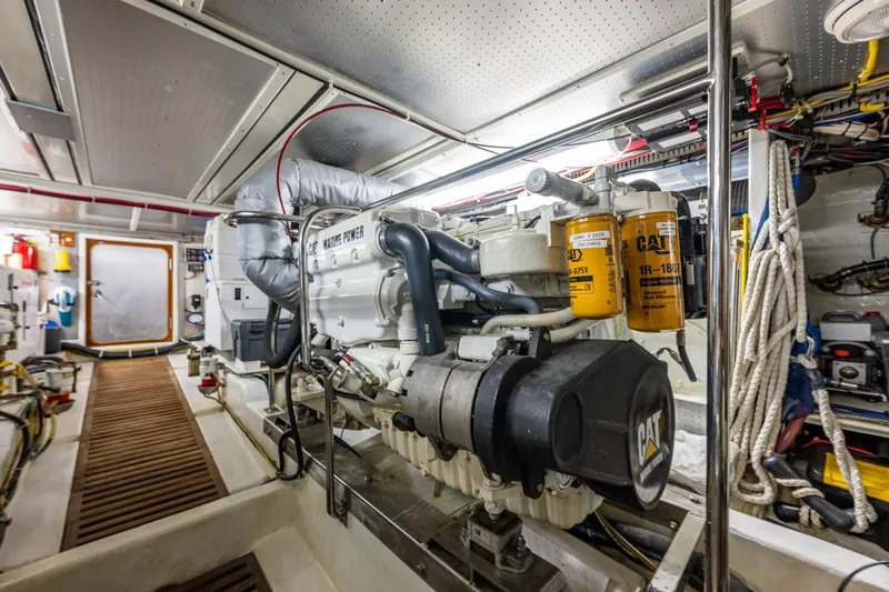 Flyin Low Yacht Photos Pics Engine room of 2007 DeFever 56 yacht with CAT marine power engine.