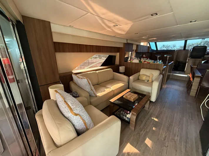 Yacht Photos Pics Luxurious interior of 2007 Fairline Squadron 68 yacht with elegant seating and modern design.