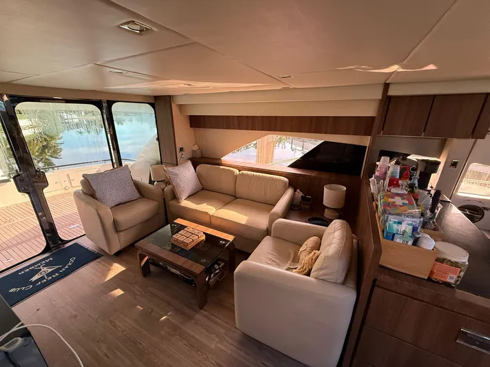  Yacht Photos Pics Luxurious interior of 2007 Fairline Squadron 68 yacht with comfortable seating and modern amenities.