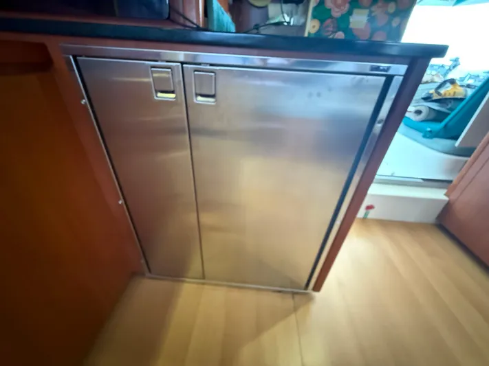 White Wings Yacht Photos Pics Stainless steel double-door cabinet in a Leopard 48 yacht kitchen, 2013 model.