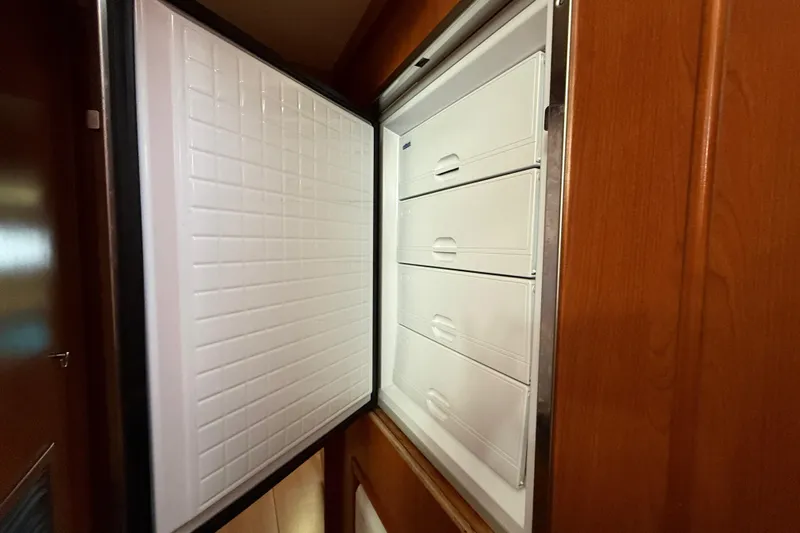 White Wings Yacht Photos Pics Open freezer with multiple drawers inside a 2013 Leopard 48 yacht.