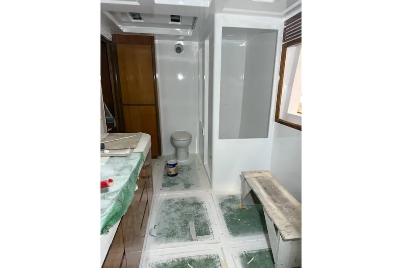 Opportunity Yacht Photos Pics Modern yacht bathroom under construction, featuring a toilet and shower area, Artemis 100, 2026 model.
