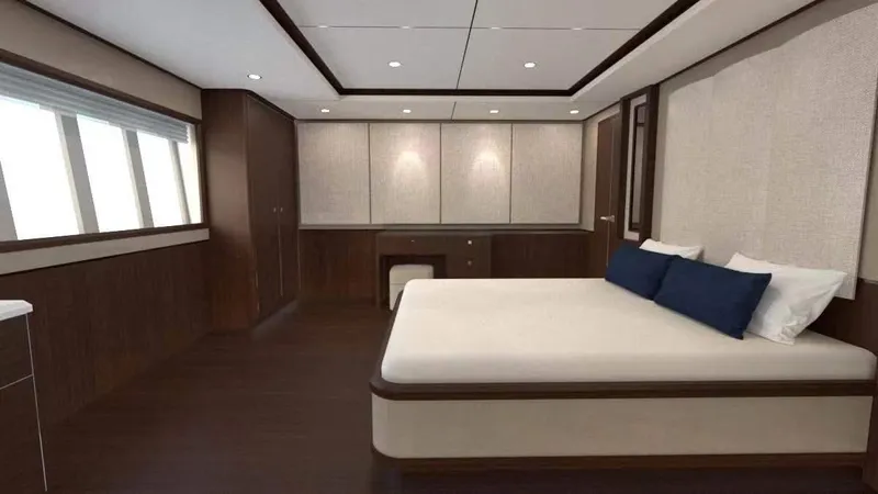 Opportunity Yacht Photos Pics Luxurious bedroom interior in Artemis 100 yacht, 2026 model, featuring modern design and elegant furnishings.