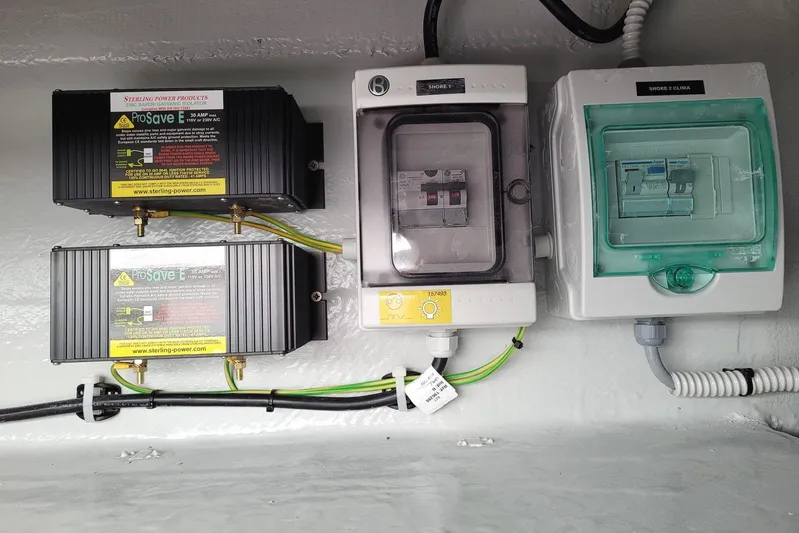  Yacht Photos Pics Electrical panel setup on a 2021 Lagoon 46 yacht, featuring ProSave devices and circuit breakers.