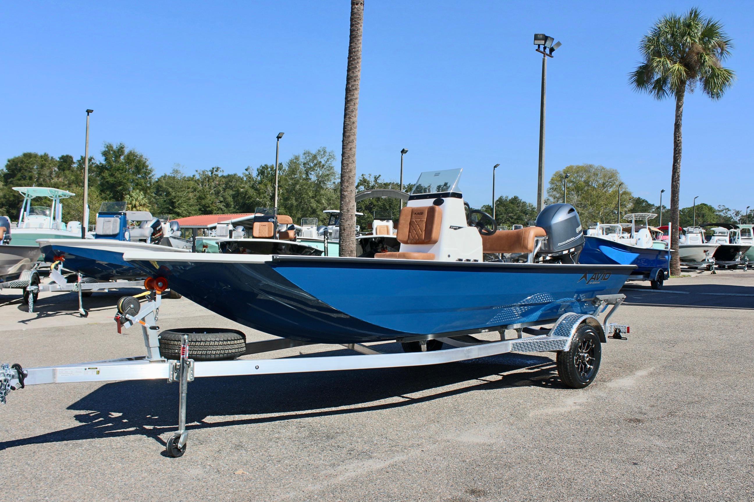 2025 Avid 18 Rogue CC boat on trailer in sunny outdoor setting.