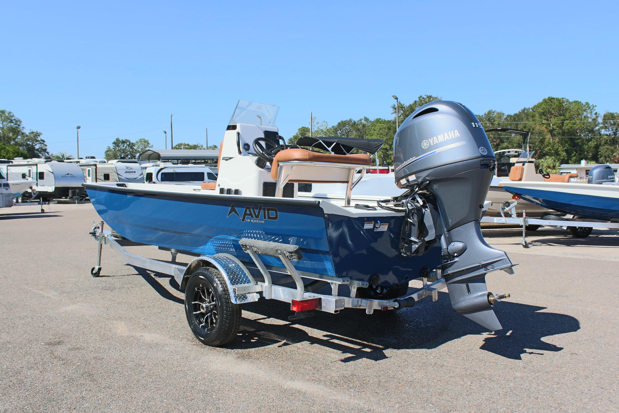 2025 Avid 18 Rogue CC boat with Yamaha engine on trailer in parking lot.