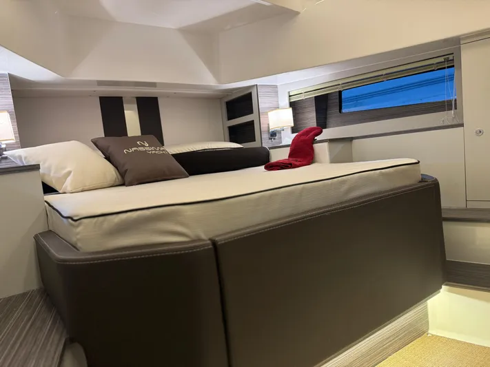  Yacht Photos Pics Luxurious bedroom interior of 2025 Nassima Yacht N40 with modern design and cozy bedding.